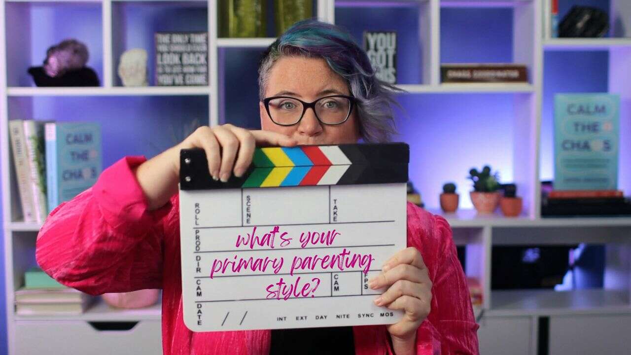 Dayna Abraham holding a clapperboard